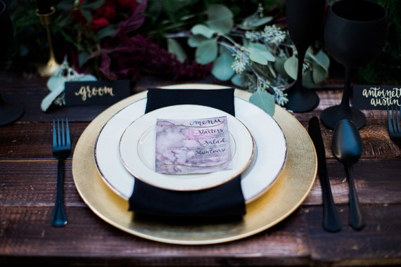 Black and gold place setting