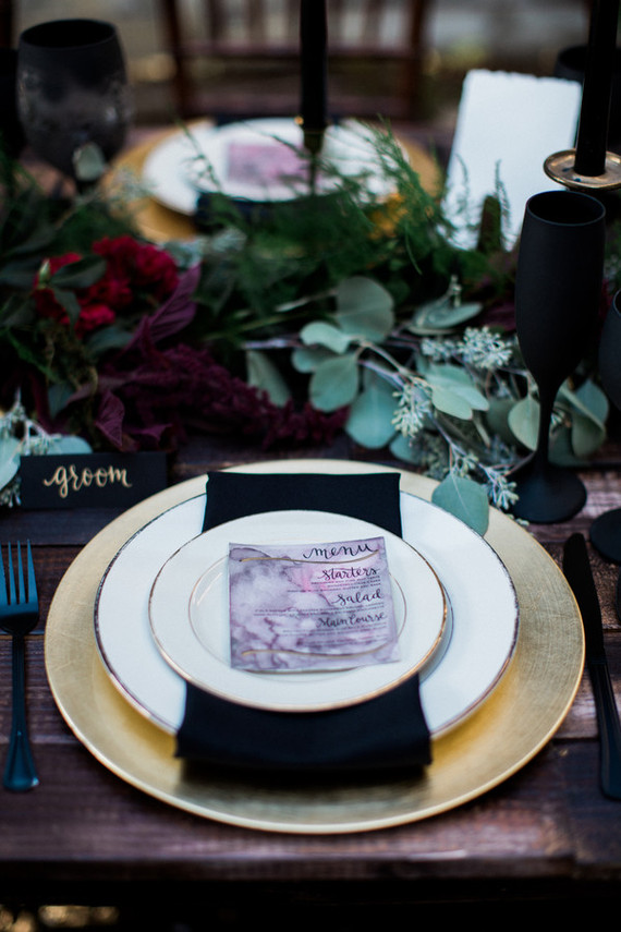 Black and gold place setting