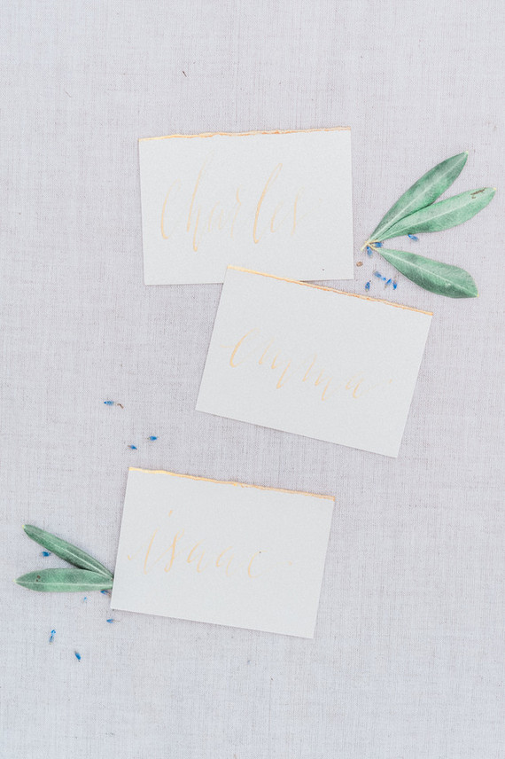 Elegant gold escort cards