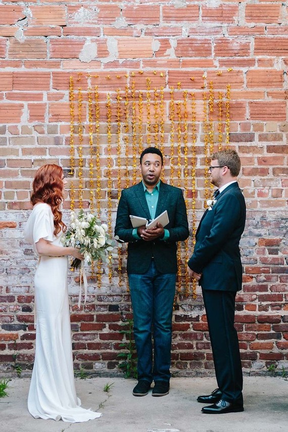 Gold paper crane ceremony backdrop,