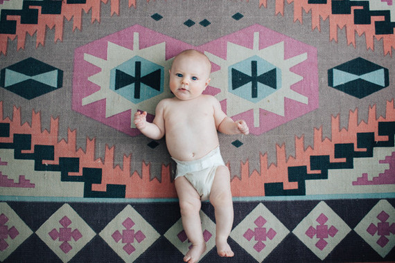 boho rug and baby portrait