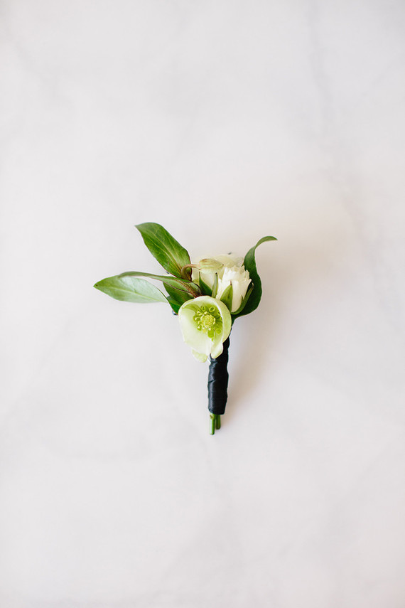 Green and white boutonnière