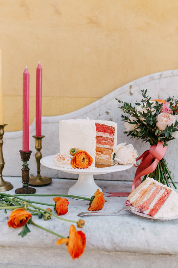 White and orange wedding cake