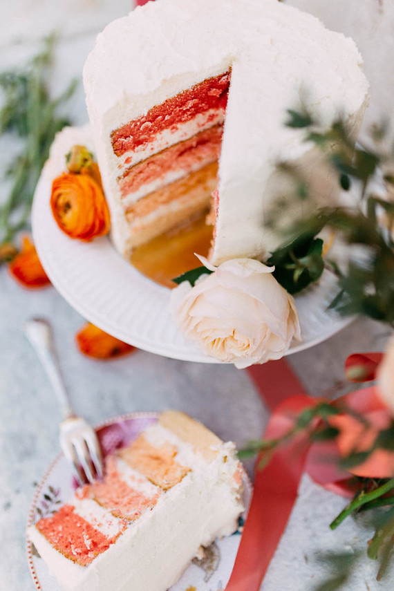 White and orange wedding cake