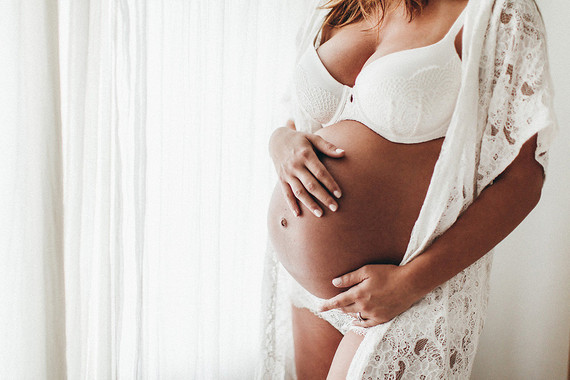 all white boudoir maternity photos