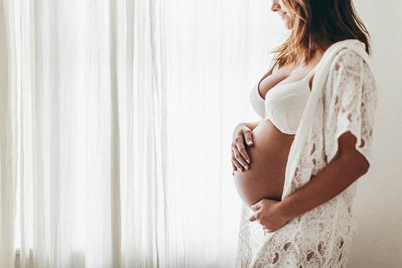 all white boudoir maternity photos