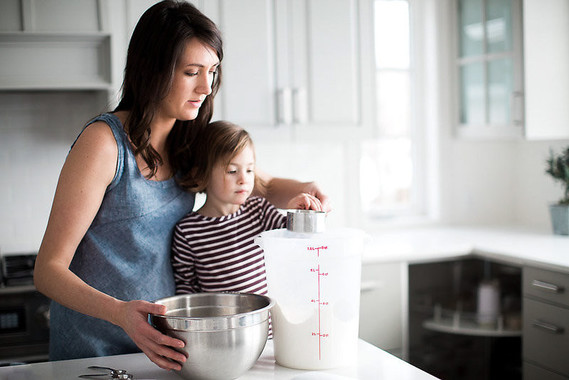 mother daughter baking session at home