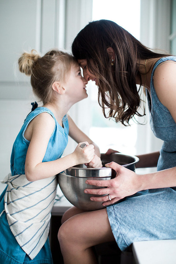 mother daughter baking session at home