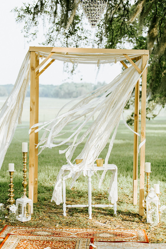 Rustic bohemian ceremony arbor
