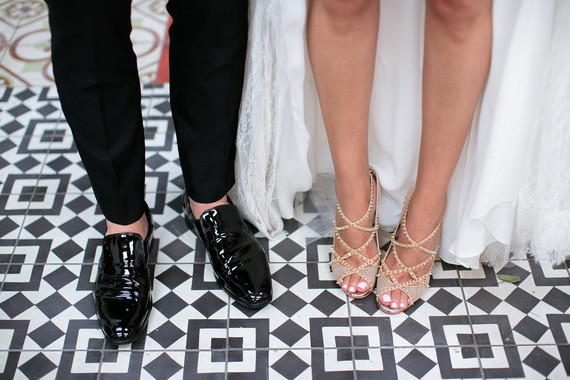 black and white tile with stylish wedding shoes