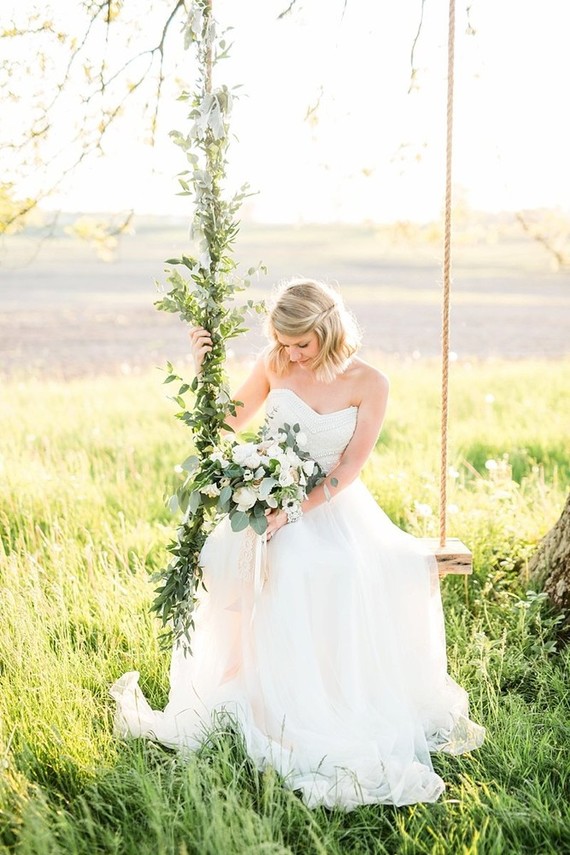 bridal portraits on a swing