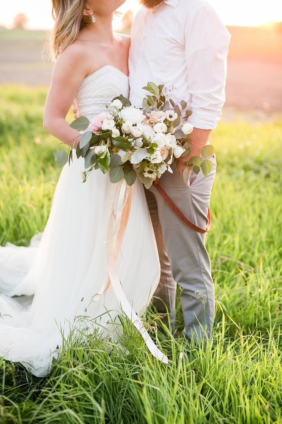 sunset wedding photos in a field