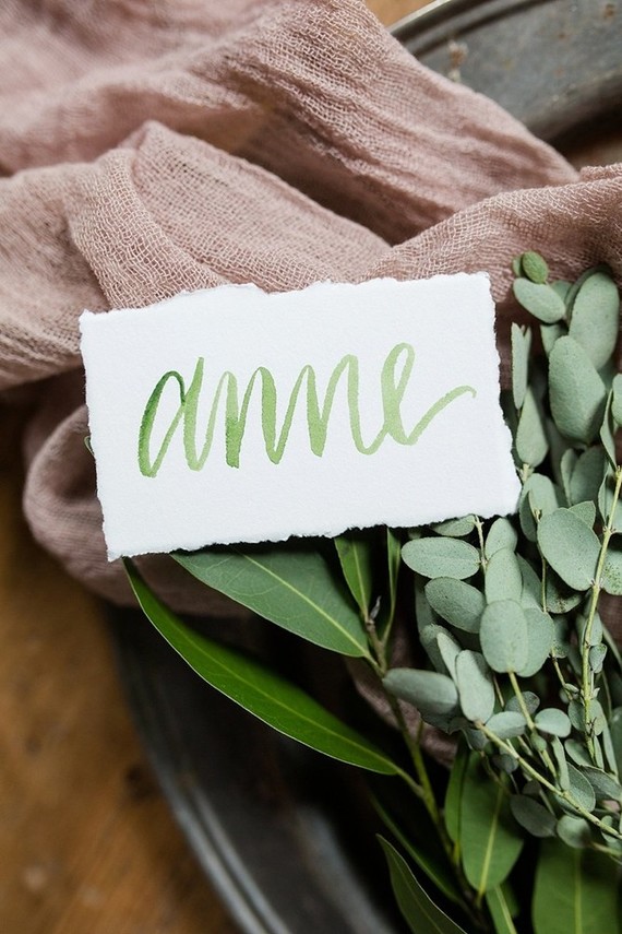 green calligraphy place cards