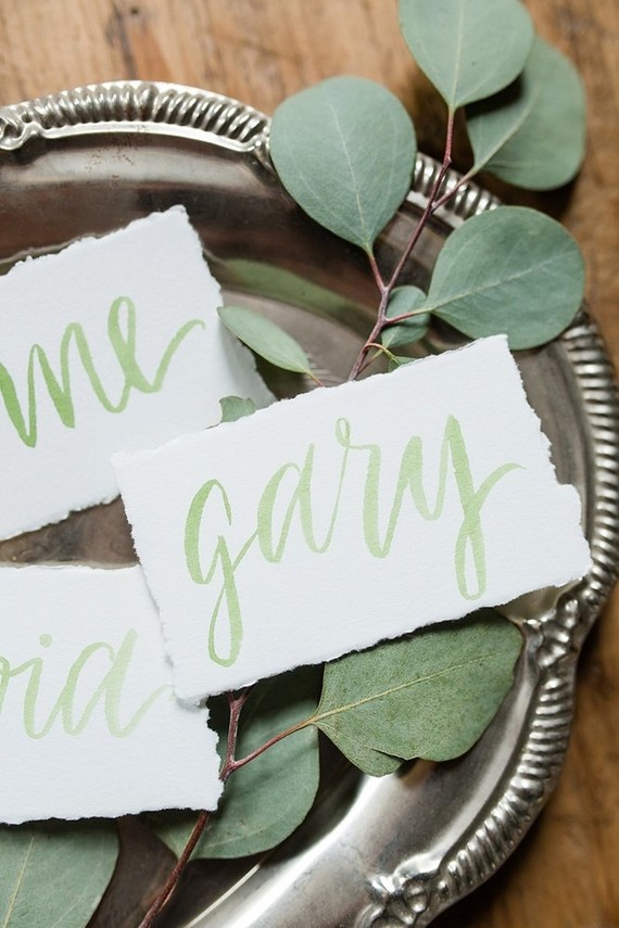 green calligraphy place cards