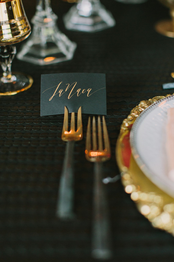 black and gold place setting