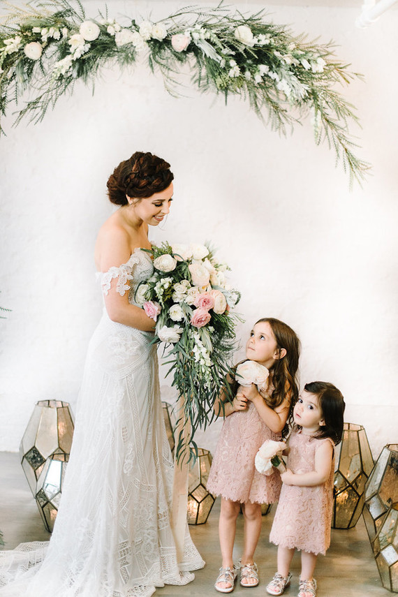 bride with flower girls