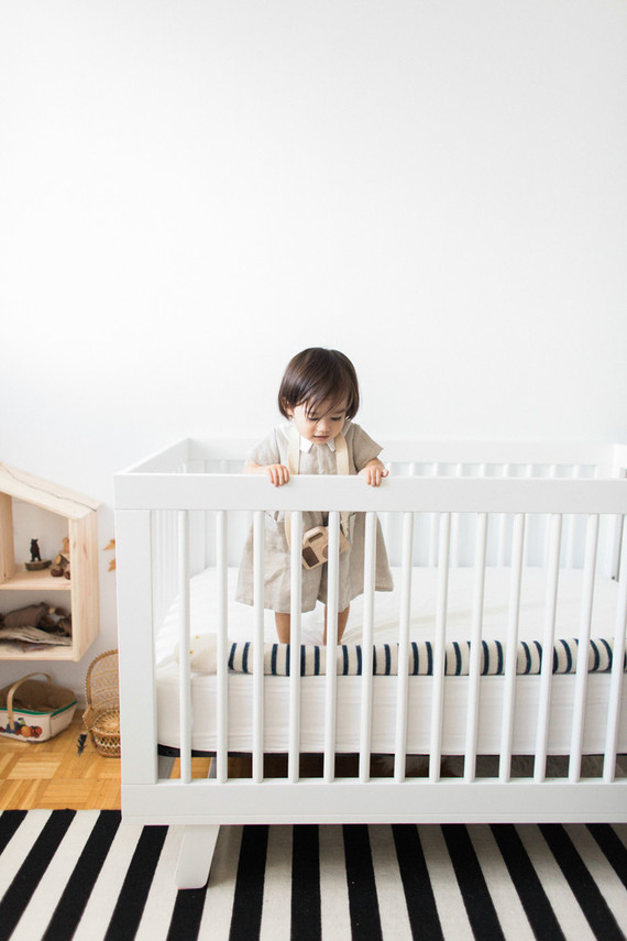 Modern wood and white nursery