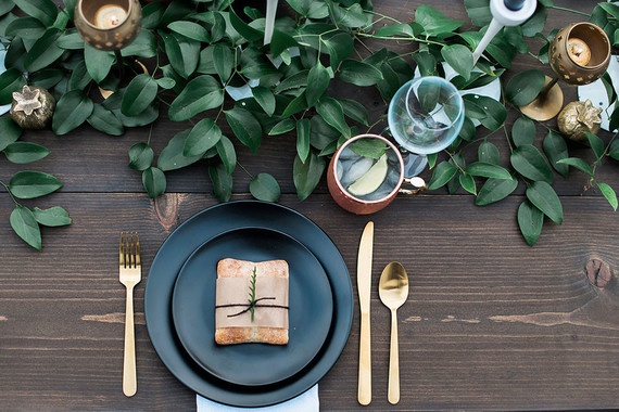 Black and gold place setting