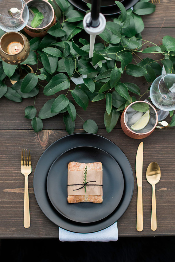 Black and gold place setting