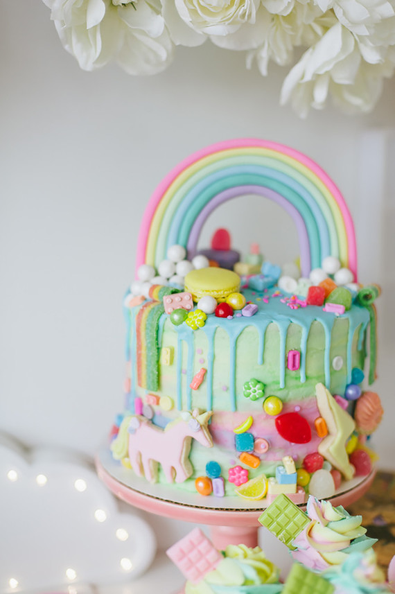 messy rainbow birthday cake