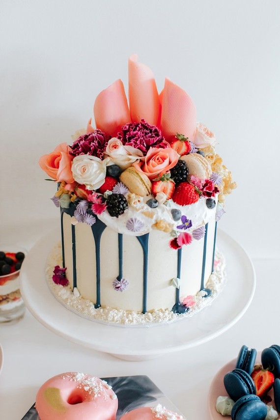 Berries and blooms drip cake Inspiration