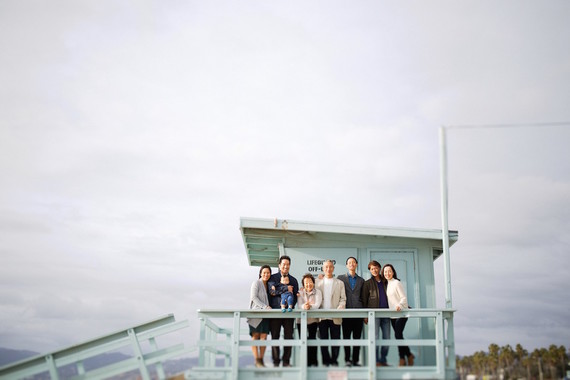 multi generation family photos at the beach