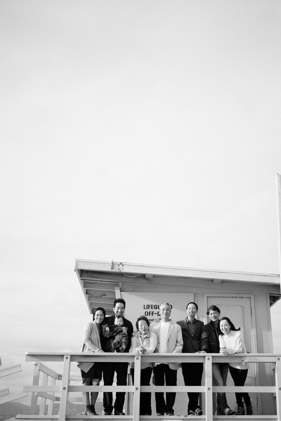 multi generation family photos at the beach