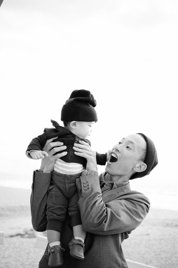 multi generation family photos at the beach