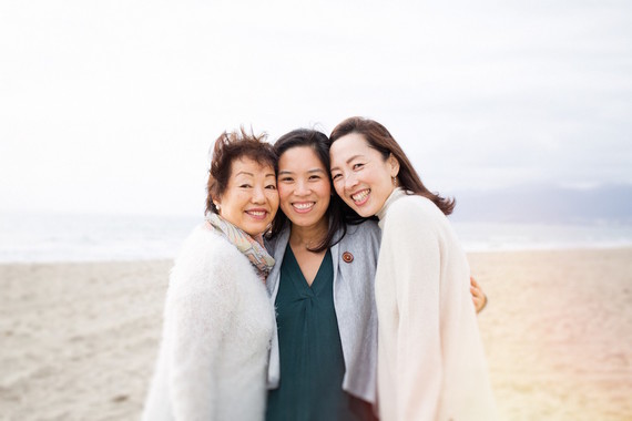 multi generation family photos at the beach