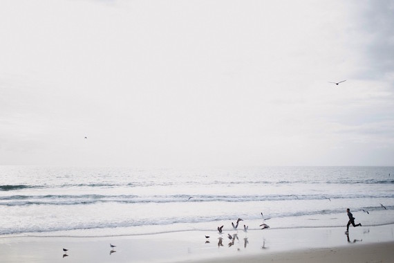 multi generation family photos at the beach
