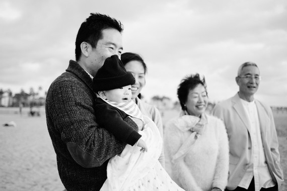 multi generation family photos at the beach
