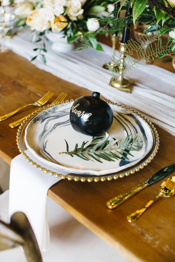 Black and gold place setting