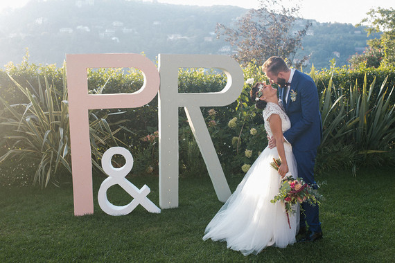Bride and groom wedding signs