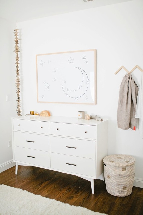 Modern, bright designer nursery by Almost Makes Perfect