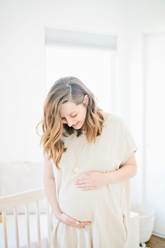 Modern, bright designer nursery by Almost Makes Perfect