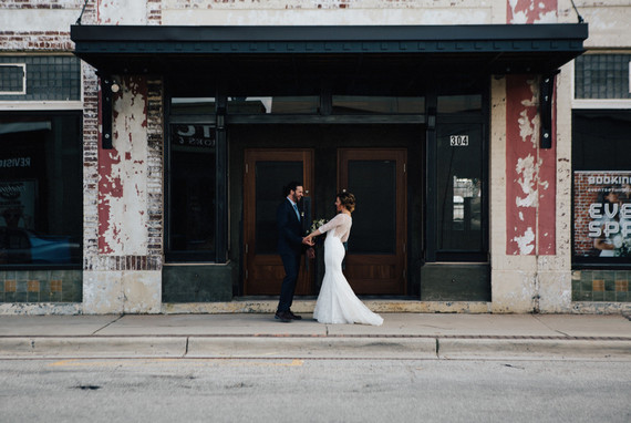 Industrial wedding inspiration at a Cadillac Service Garage