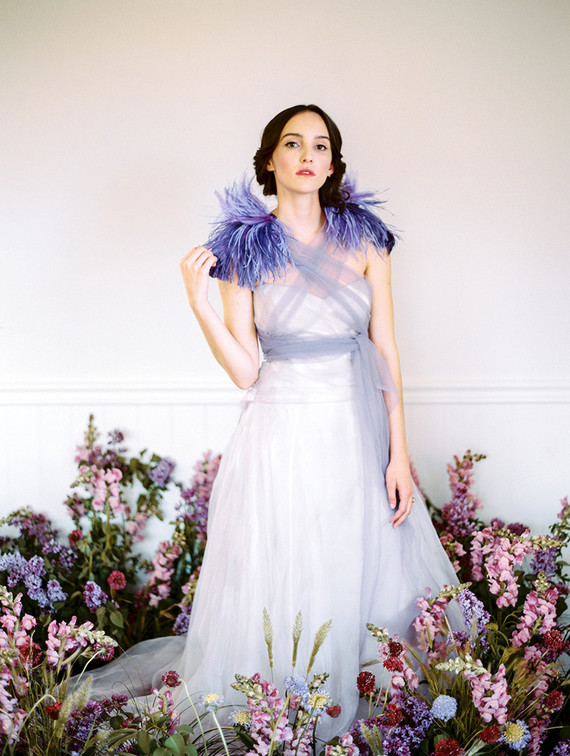 Monique Lhuillier wedding dress with I Do Style Collective feathers