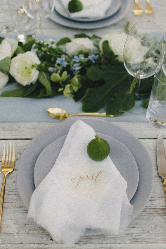 Gray and gold place setting