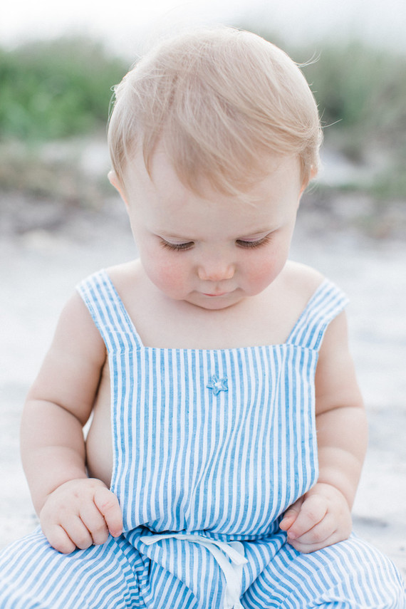 Summery matching sibling photos on the beach