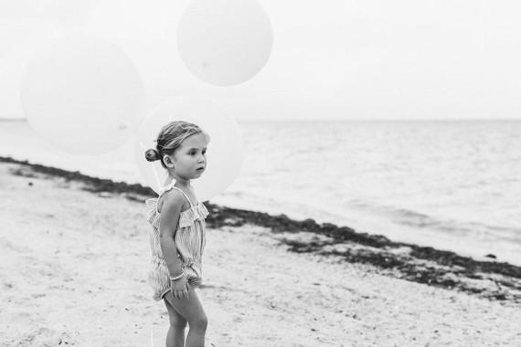 Summery matching sibling photos on the beach
