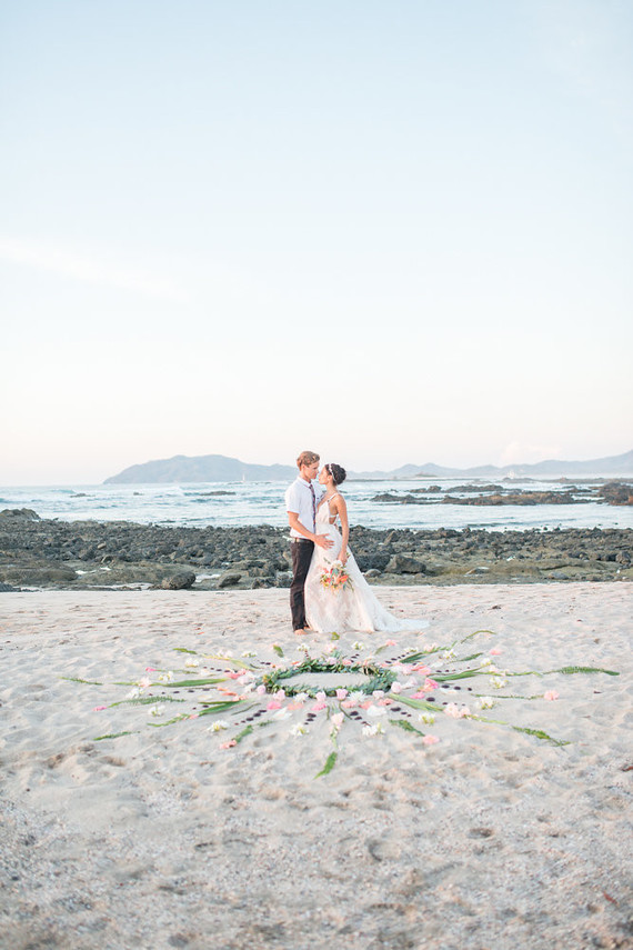 floral mandala on the beach