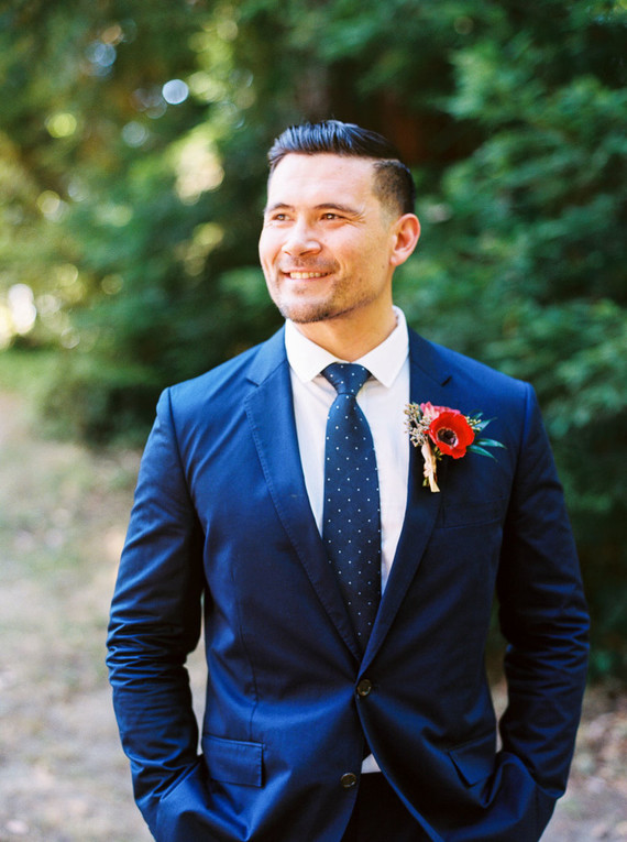 groom in blue suit