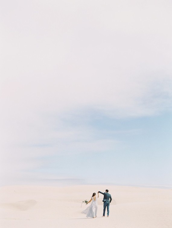 Pastel sand dune engagement photos