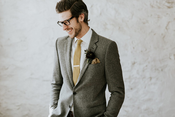 Groom in a grey suit