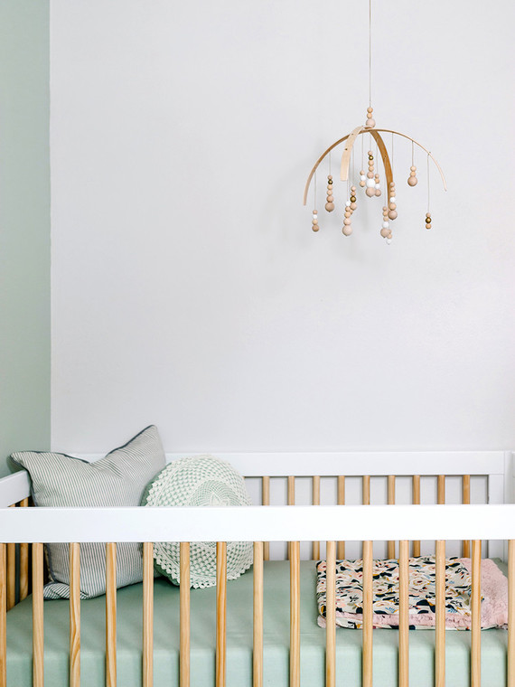 Mint and white nursery design