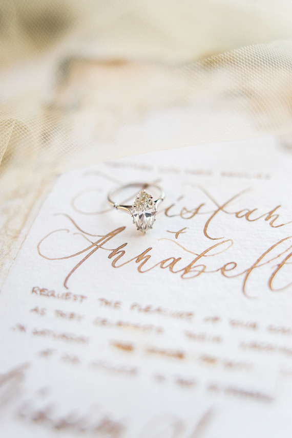 romantic calligraphy and engagement ring