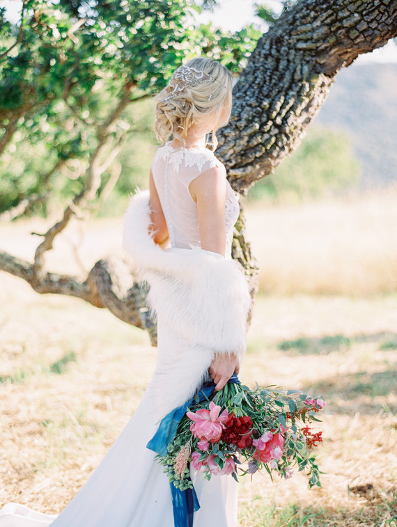 Beautiful bridal portrait with fur wrap