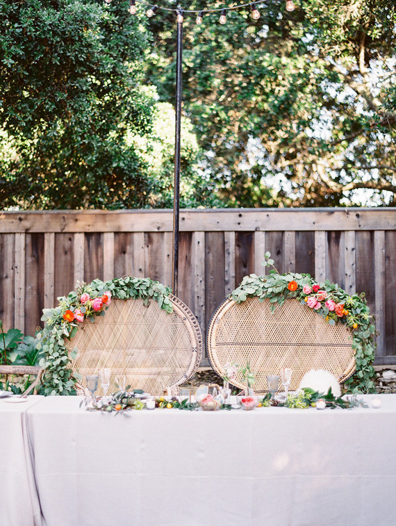 Sweetheart table with boho rattan chairs Inspiration