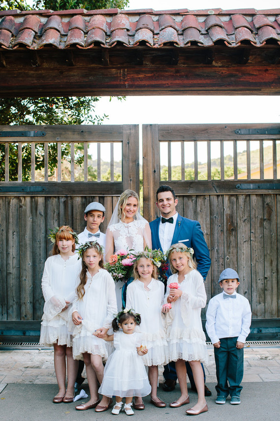 bride and groom with flower girls and ring bearers