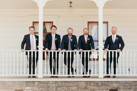 Farmhouse wedding party portrait